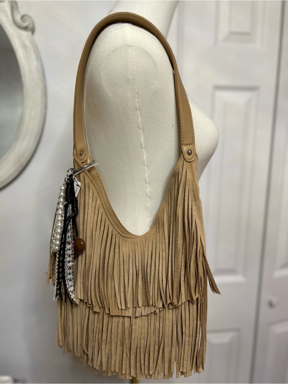 Fringed Tan Suede Shoulder Bag with Decorative Tassel Charm